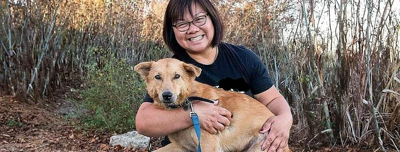 happy Women with her rescued dog