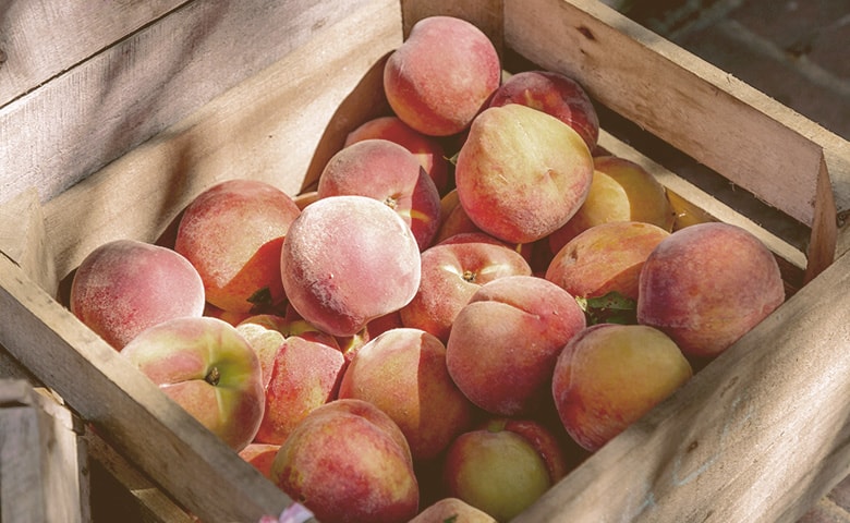 crate of peaches